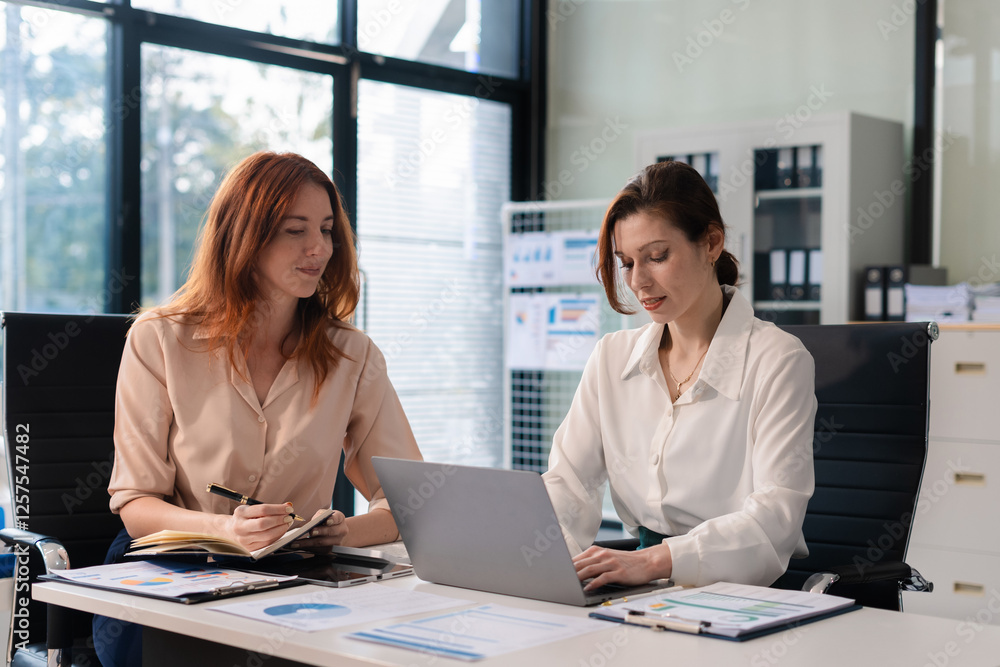 Fototapeta premium Collaboration, strategy, and success in a modern office.