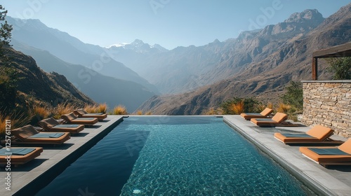 Serene mountain resort with a luxurious pool overlooking majestic peaks and tranquil nature