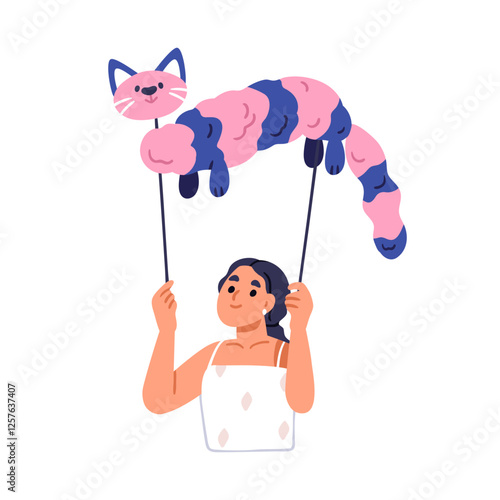 Holding marionette toy on sticks for puppet theater. Girl actor with cute cat...