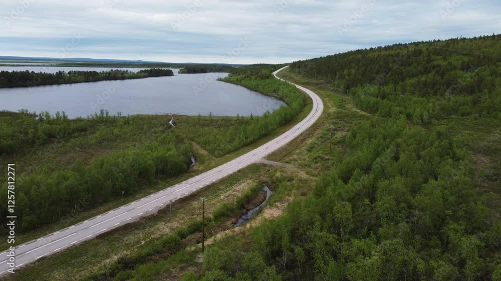 aerial above scenic narrowed road path In Sweden countryside aerial above scenic narrowed road path In Sweden countryside