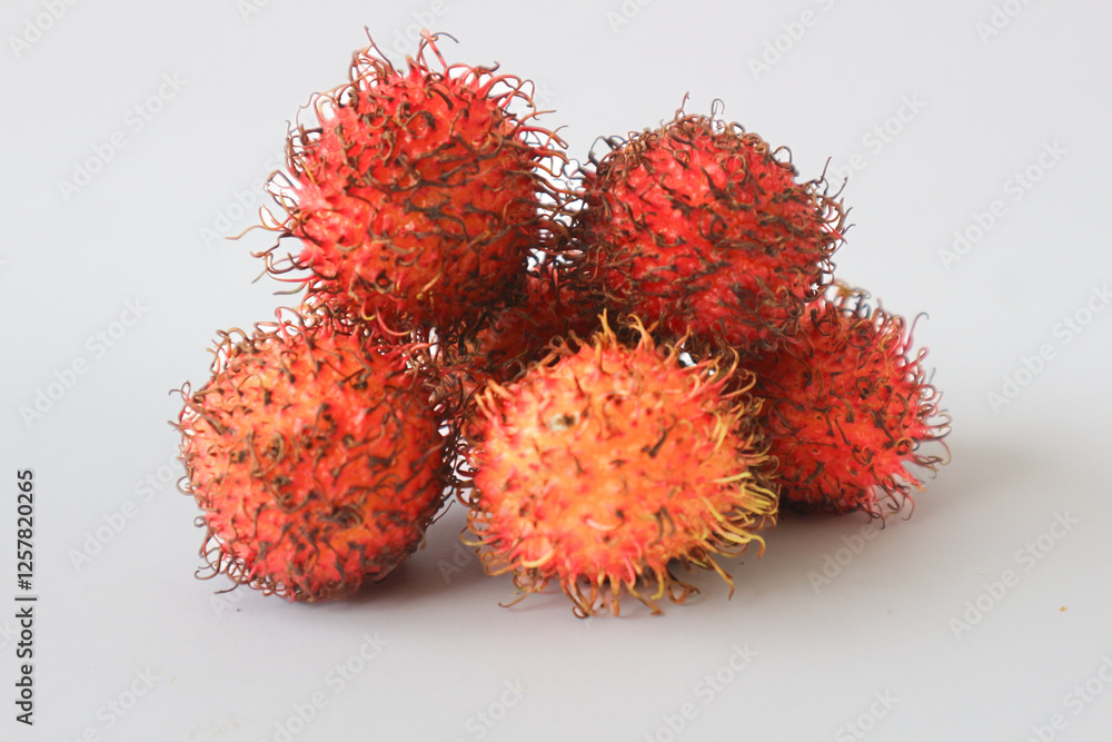 Rambutan taxonomic name: Nephelium lappaceum is a medium-sized tropical tree in the Sapindaceae family. Rambutan taxonomic name: Nephelium lappaceum is a medium-sized tropical tree in the Sapindaceae family.