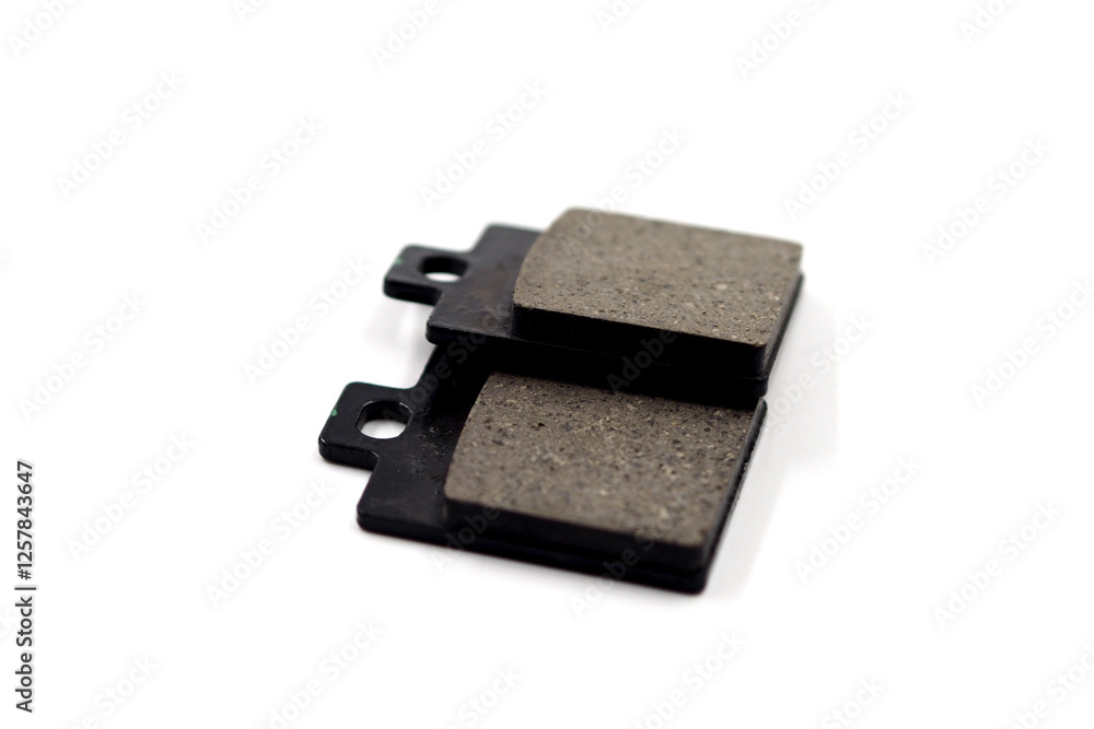 Couple of braking pads for motorbikes, isolated on white Couple of braking pads for motorbikes, isolated on white