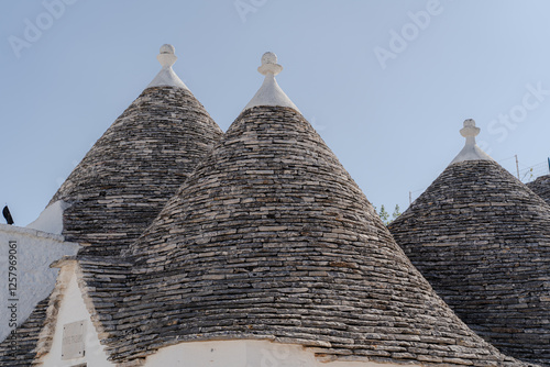 Architecture. White houses in Apulia. Conical roof. photo