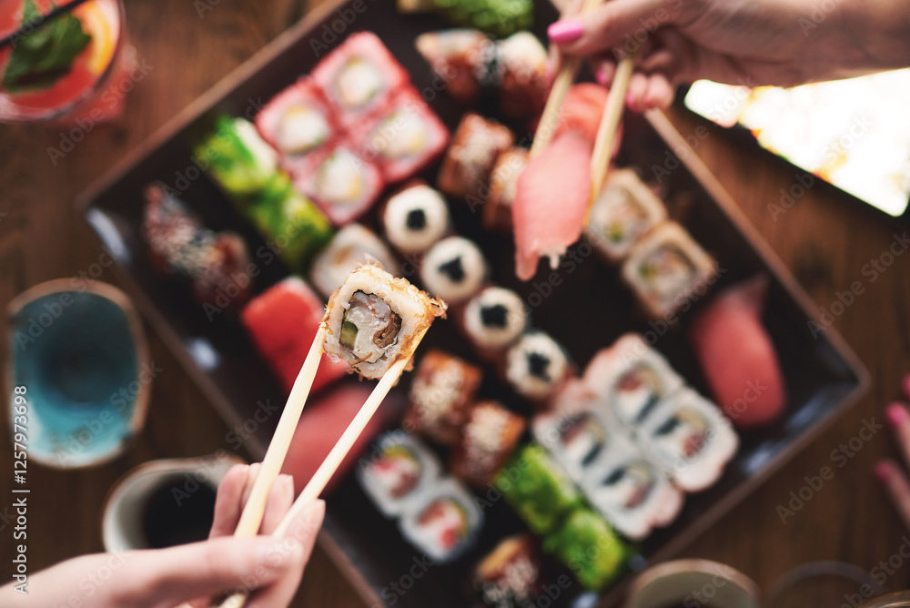 Close-up of sushi rolls arranged on a wooden plate, showcasing vibrant colors and textures. The composition highlights the freshness and artistry of Japanese cuisine Close-up of sushi rolls arranged on a wooden plate, showcasing vibrant colors and textures. The composition highlights the freshness and artistry of Japanese cuisine