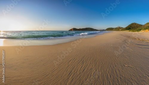 Wallpaper Mural playa pariadisaca de arena fina blanca, con aguas cristalinas y cielo azul, en un precioso atardecer de hora dorada, concepto de postal de viaje Torontodigital.ca