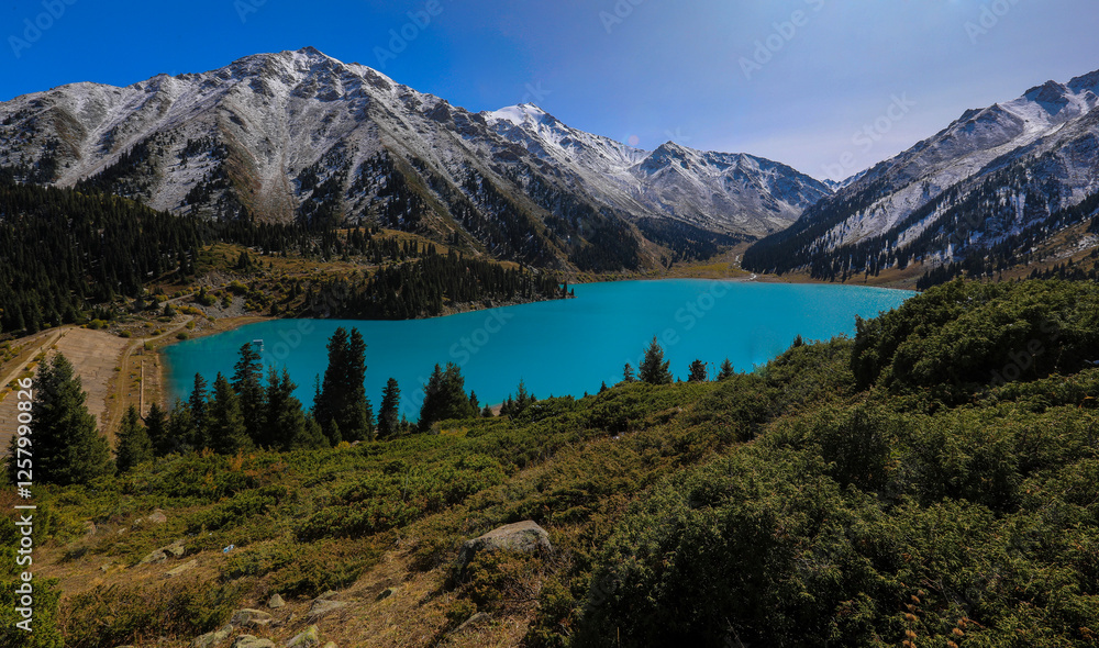 Naklejka premium Big Almaty Lake, a picturesque lake 20 kilometers from Almaty.