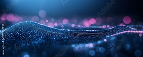 Abstract digital landscape with glowing particles in waves