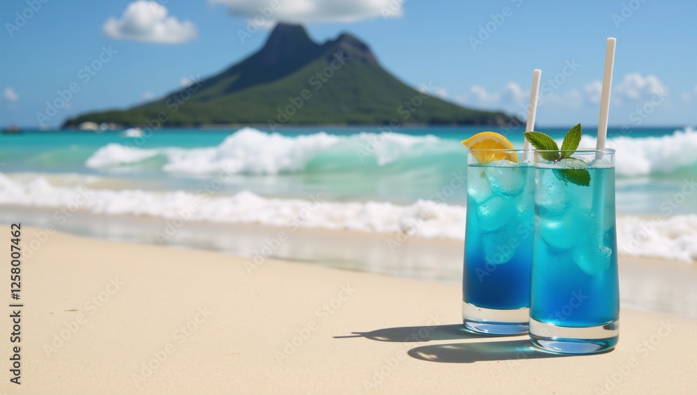 Tropical setting Two chilled blue cocktails on a sandy beach by mountains Tropical setting Two chilled blue cocktails on a sandy beach by mountains