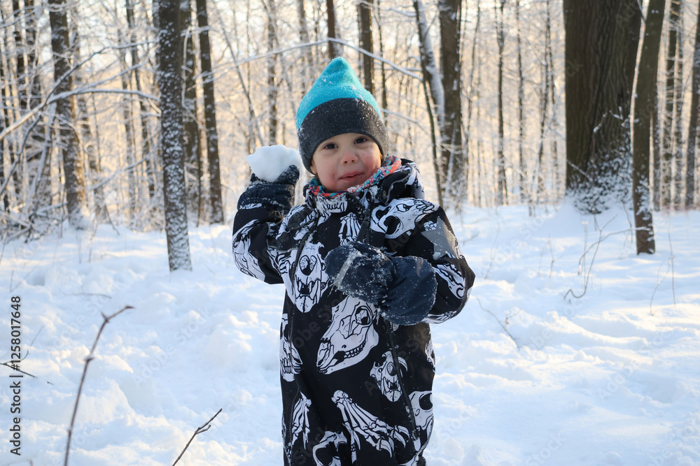 little boy in winter park