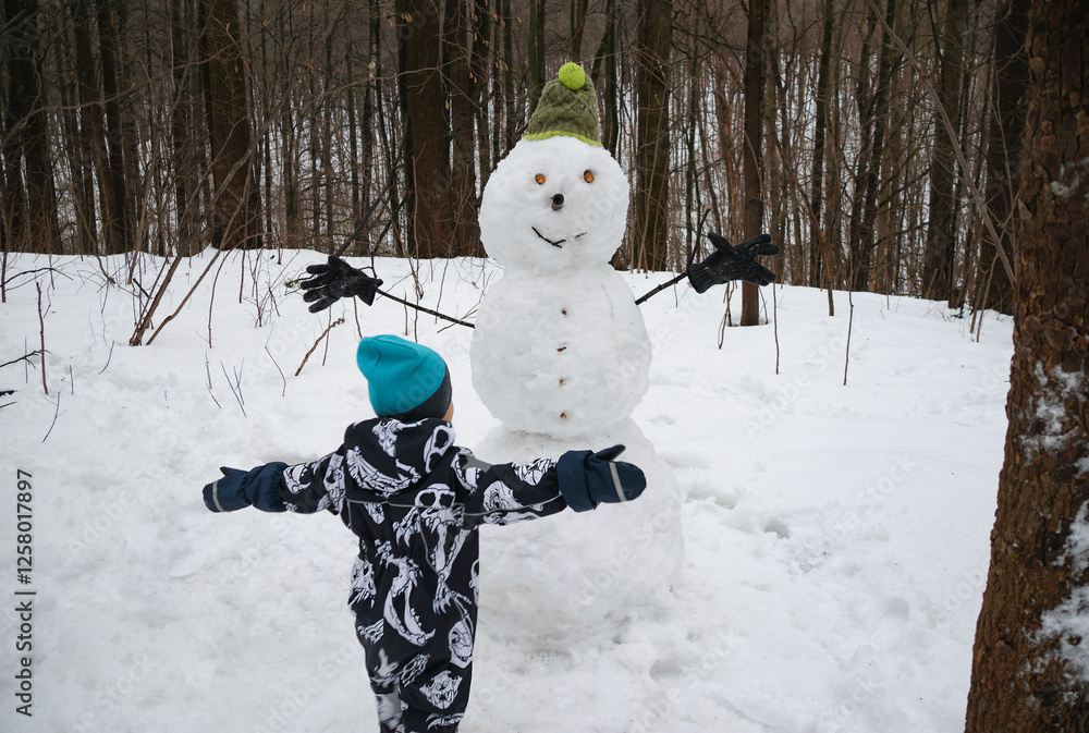 little boy in winter park