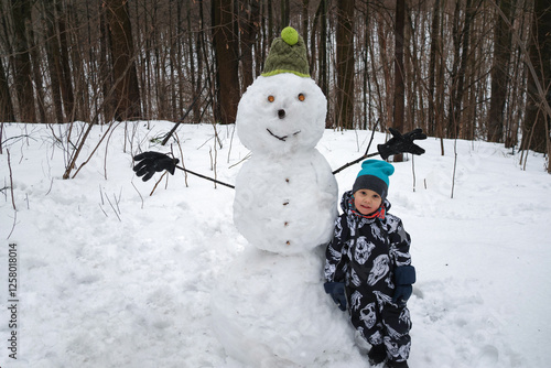 little boy in winter park