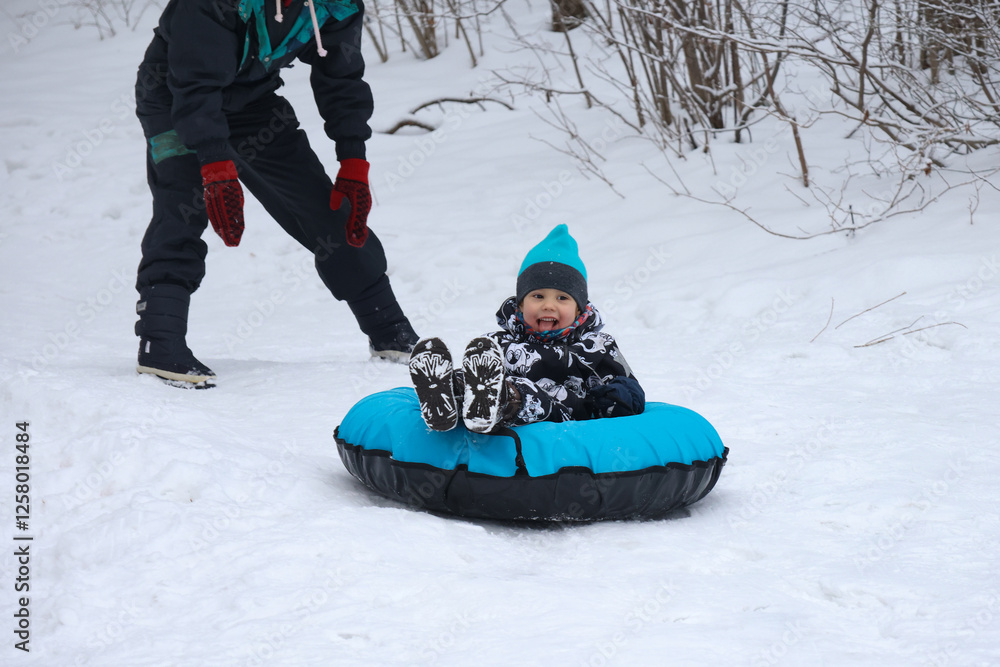 little boy in winter park