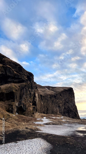 The big rocks and the blue clouds sky.