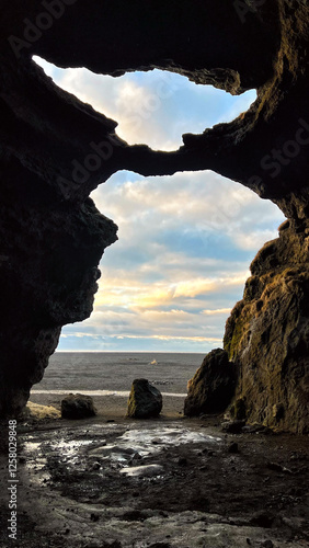 View from the cave and blue clouds sky.