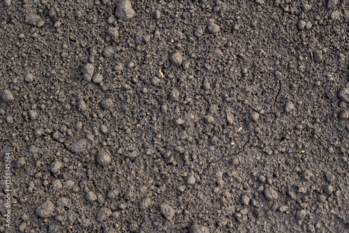 Rocky soil.  rocky stone terrain. Texture of stone . Sandy and rocky soil texture.