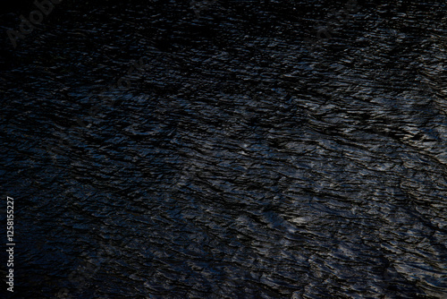 Canvas Print water ripples in the river Liffey, Dublin, Ireland