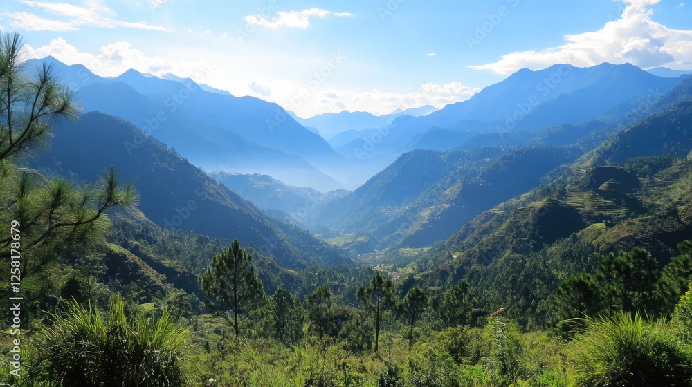Expansive valley with towering mountain ranges in the distance Expansive valley with towering mountain ranges in the distance