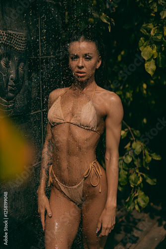 Tropical Refreshment: Woman Showering in Paradise with Glowing Skin