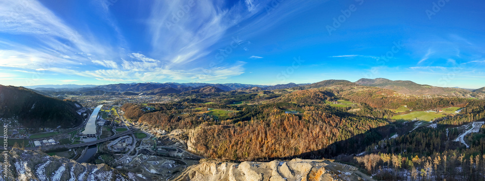 Naklejka premium Panorama view of the region north of Graz, Austria with the stone pit Kanzelsteinbruch and the towns Judendorf, Gratwein and Gratkorn