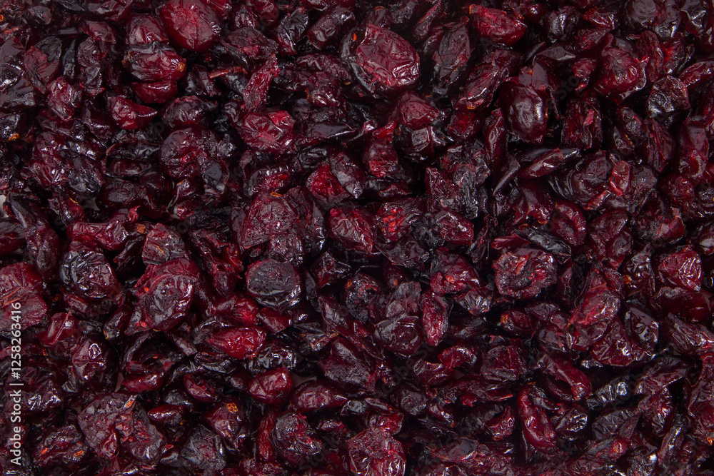 Dried cranberries as a background. Close-up shot. Top view. Dried cranberries as a background. Close-up shot. Top view.