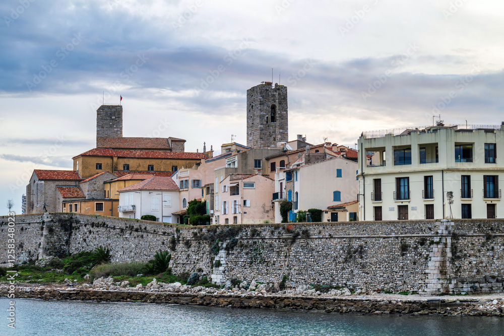 Fototapeta premium Antibes castle and central square, wall and tower by the sea