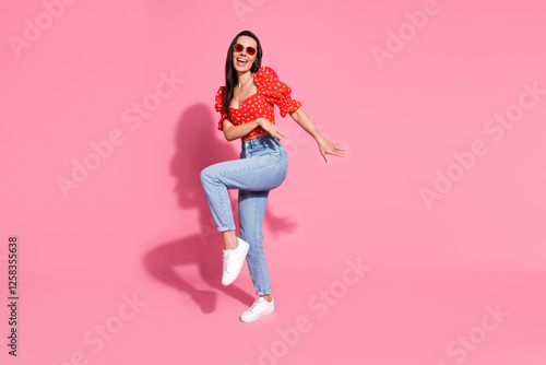 Full body portrait of nice young lady dance empty space wear top isolated on pink color background