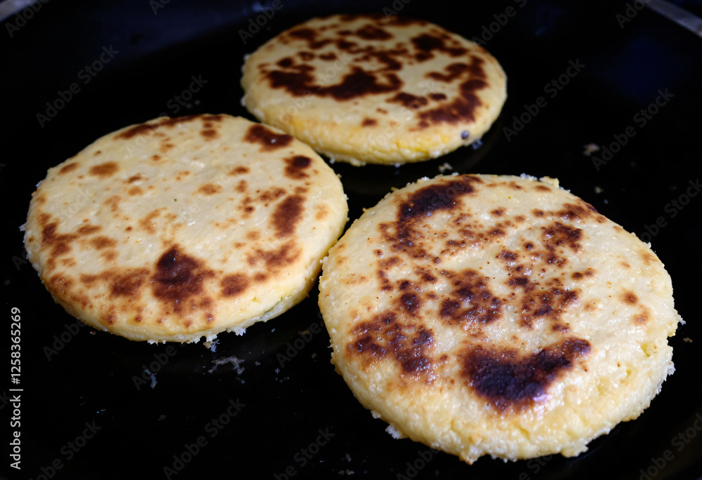 Traditional dish made from masa dough filled with various ingredients Traditional dish made from masa dough filled with various ingredients