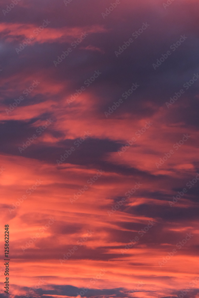 Obraz premium Cloudy red sunset sky