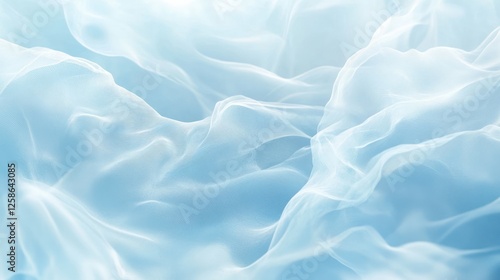 A soft, ethereal blue fabric gently flowing, creating a serene and calming atmosphere. Ideal for backgrounds or artistic abstract designs.
