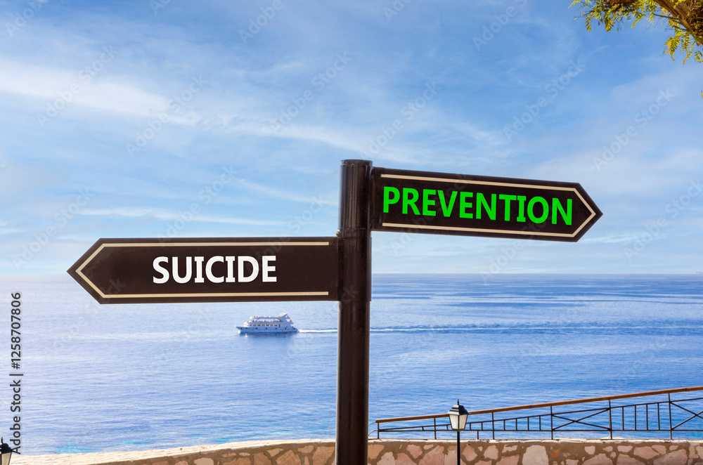 Obraz premium Suicide prevention symbol. Concept words Suicide prevention on beautiful road sign. Beautiful blue sky and clouds background. Psychological suicide prevention concept. Copy space.