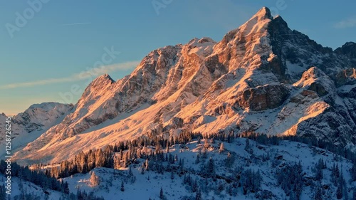 Aerial drone view of snow on the mountains in the Dolomites, Italy