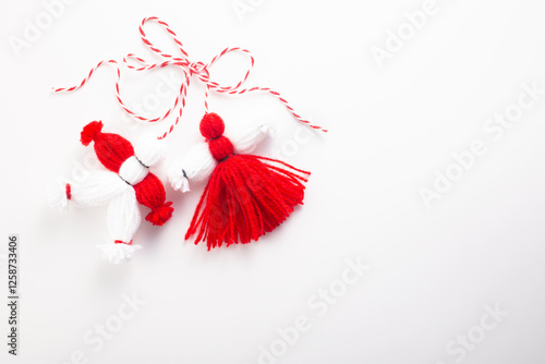  Traditional Martenitsa on white background. Baba Marta, greeting card. Flat lay