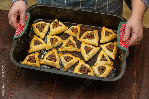 Sweet pastries triangular gomentashi ears of aman for the holiday of Purim photo