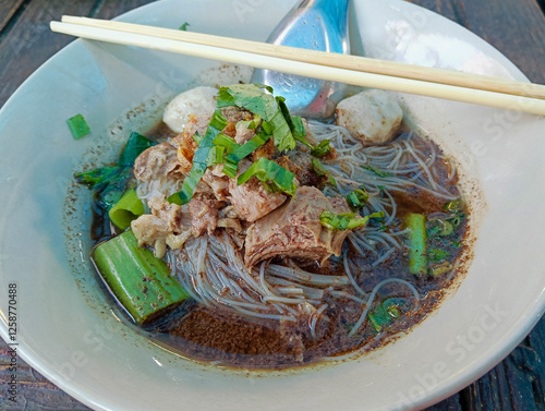 Thai Beef Noodle Soup with Meatballs and Fresh Herbs