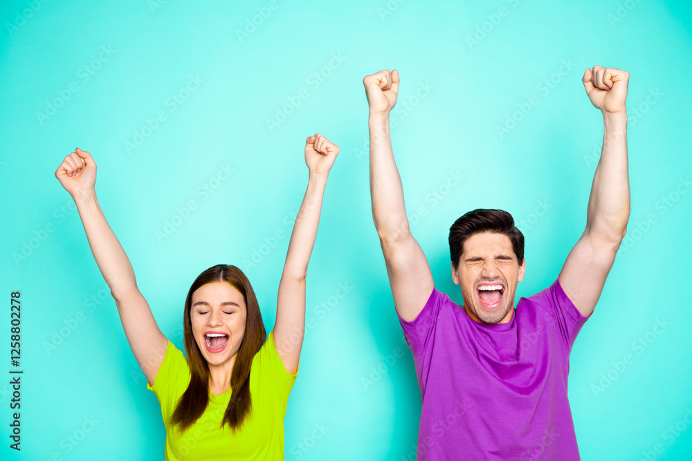 Portrait of his he her she nice attractive overjoyed crazy cheerful cheery couple celebrating startup project profit rising hands up isolated over bright vivid shine vibrant green turquoise background Portrait of his he her she nice attractive overjoyed crazy cheerful cheery couple celebrating startup project profit rising hands up isolated over bright vivid shine vibrant green turquoise background