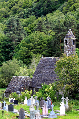 Medieval monastery Glendalough on the green island Ireland photo