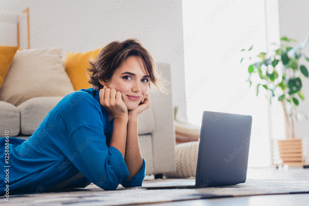 Photo of pretty cute good mood girl lying on floor alone cozy weekend at home Photo of pretty cute good mood girl lying on floor alone cozy weekend at home