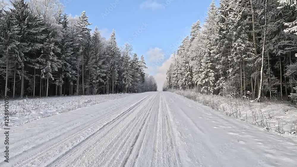 Winter road with snow, highway with cars on a sunny winter day. Winter landscape, road and shoulder covered with snow. Winter road with snow, highway with cars on a sunny winter day. Winter landscape, road and shoulder covered with snow.
