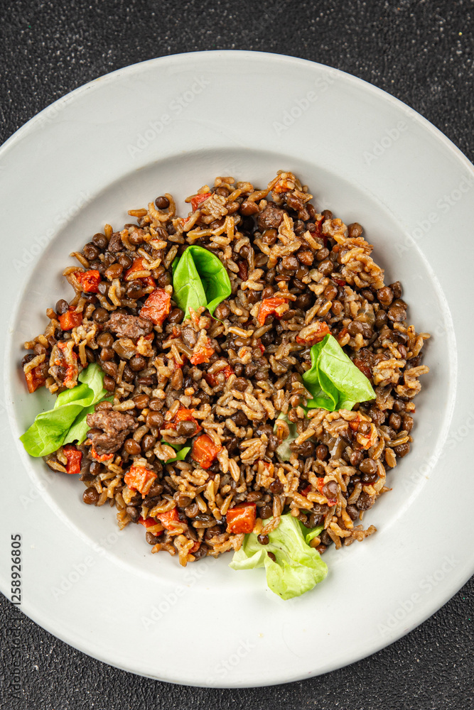 Rice lentil and vegetables snack fresh tasty food dish vegetarian vegan food no meat gourmet food background on the table rustic food top view copy space Rice lentil and vegetables snack fresh tasty food dish vegetarian vegan food no meat gourmet food background on the table rustic food top view copy space