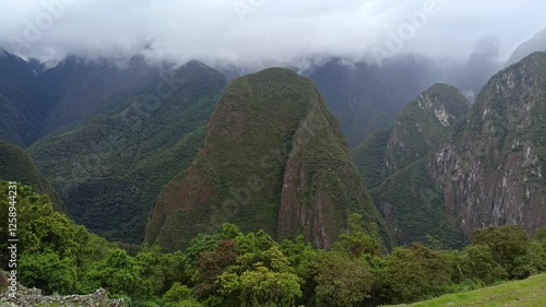 Machu Picchu ancient city view from Huchu'y Picchu in cloudy weather photo