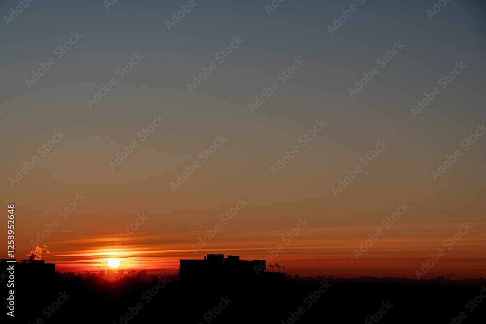 Golden Horizon Witnesses the Sun's Descent Over City Silhouettes, Painting the Sky in Vibrant Hues of Orange and Blue at Dusk. Golden Horizon Witnesses the Sun's Descent Over City Silhouettes, Painting the Sky in Vibrant Hues of Orange and Blue at Dusk.