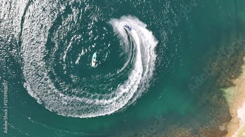 Dynamic aerial shots of jet skis and paddleboarding on turquoise waters – Adventure and motion