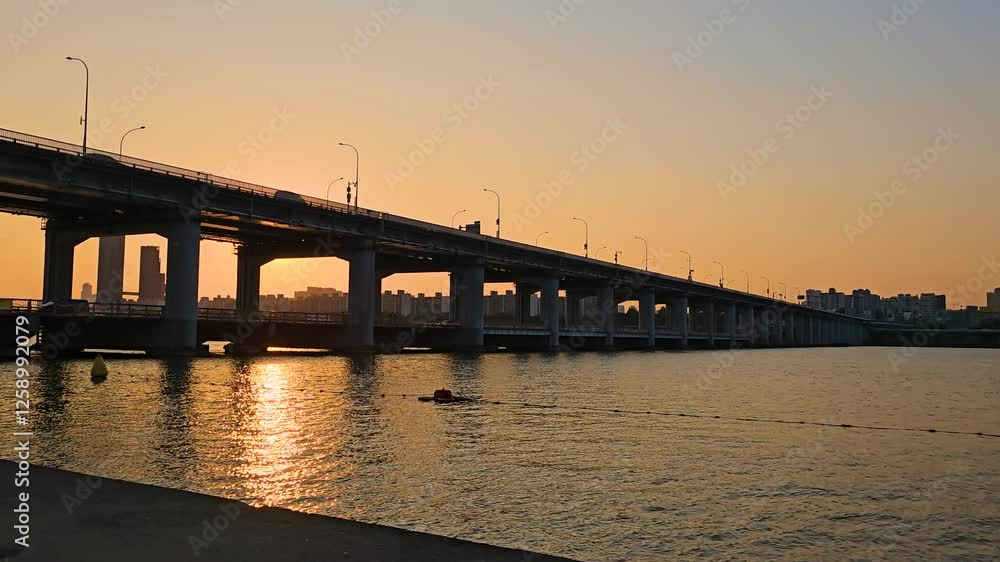 Seoul, South Korea - 3 Jun 2024 : Han River Sunset: Seoul's Golden Hour Skyline Spectacle Seoul, South Korea - 3 Jun 2024 : Han River Sunset: Seoul's Golden Hour Skyline Spectacle