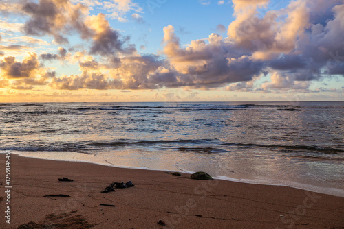 Sunrise Photos from Waipouli Beach in Kapa'a, Kauai captured from different perspectives and lighting conditions photo