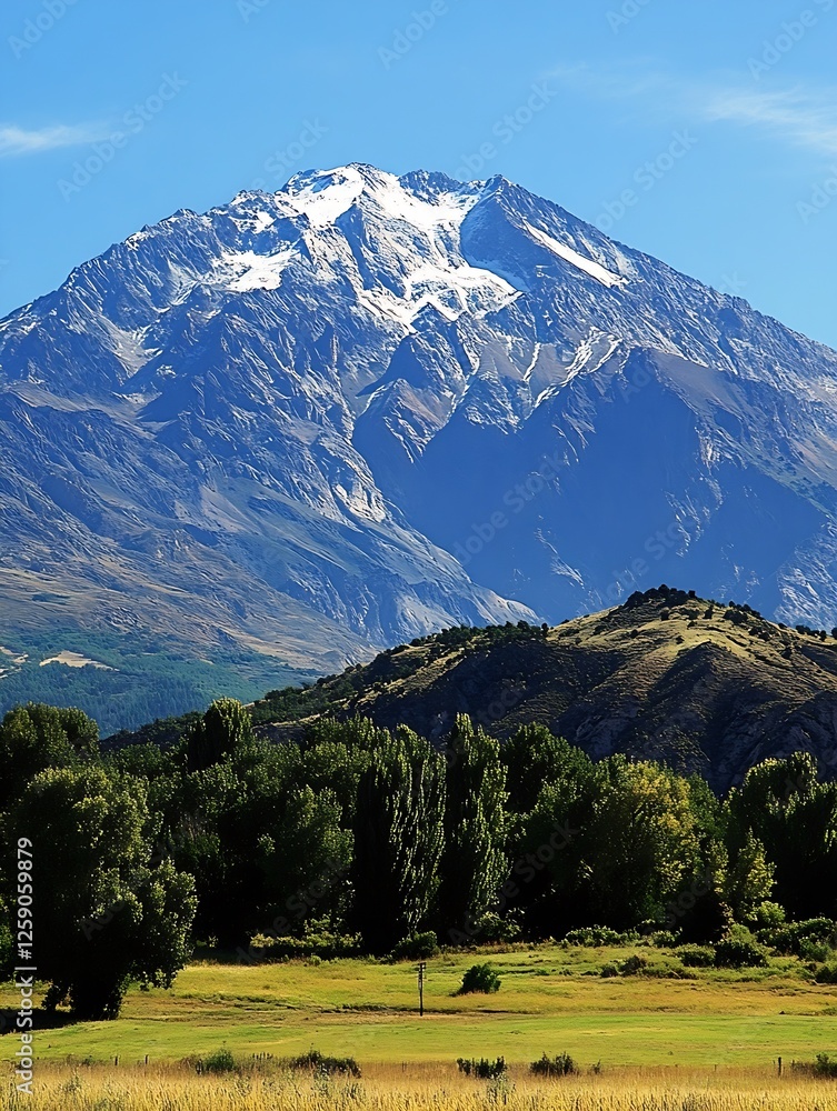Naklejka premium Majestic Mountain Landscape Under Bright Blue Sky Showcasing Nature In All Its Glory : Generative AI