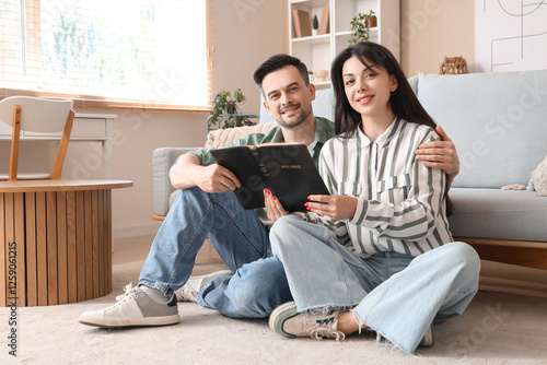 Religious couple reading Ho...