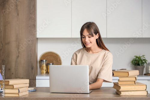 Happy female student with b...