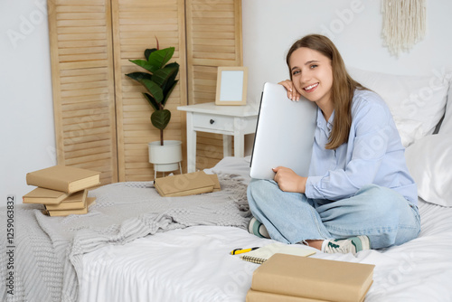 Tired female student with l...