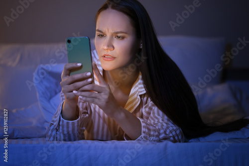 Young woman using mobile ph...