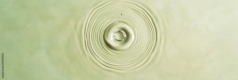 Water Drop Impact Ripples on Light Green Surface Water Drop Impact Ripples on Light Green Surface